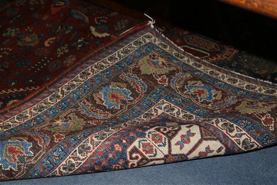 A Persian blue ground carpet 215cm x 155cm